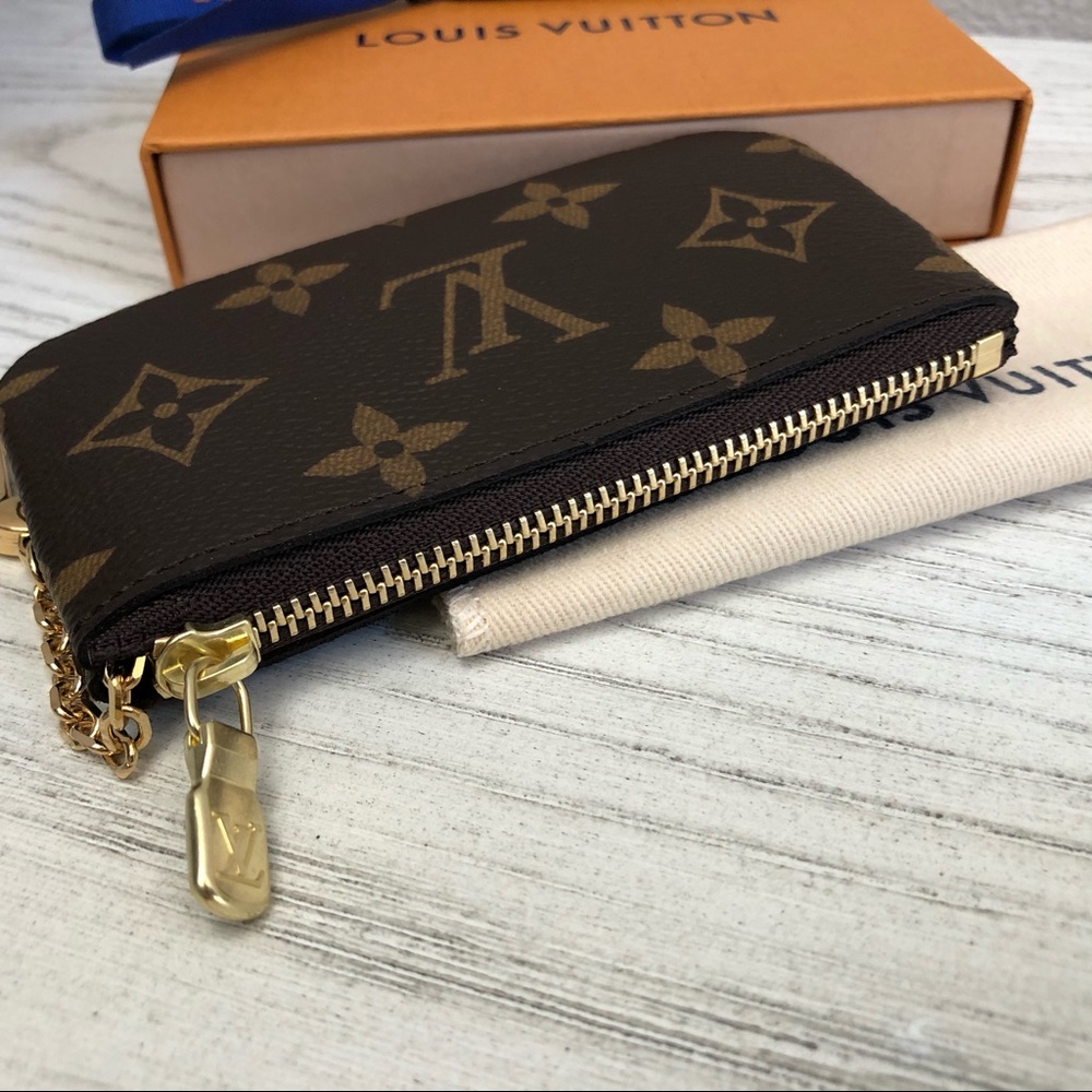 Bnib Louis Vuitton key pouch monogram